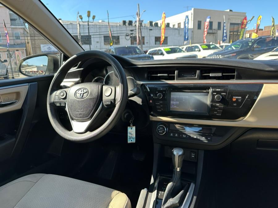 2014 Toyota Corolla 4dr Sdn Man L (Natl), available for sale in Irvington , New Jersey | Auto Haus of Irvington Corp. Irvington , New Jersey 2014 Toyota Corolla 4dr Sdn Man L (Natl), available for sale in Irvington , New Jersey | Auto Haus of Irvington Corp. Irvington , New Jersey