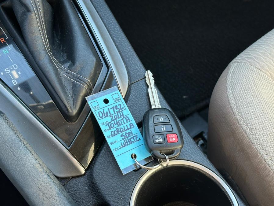 2014 Toyota Corolla 4dr Sdn Man L (Natl), available for sale in Irvington , New Jersey | Auto Haus of Irvington Corp. Irvington , New Jersey 2014 Toyota Corolla 4dr Sdn Man L (Natl), available for sale in Irvington , New Jersey | Auto Haus of Irvington Corp. Irvington , New Jersey