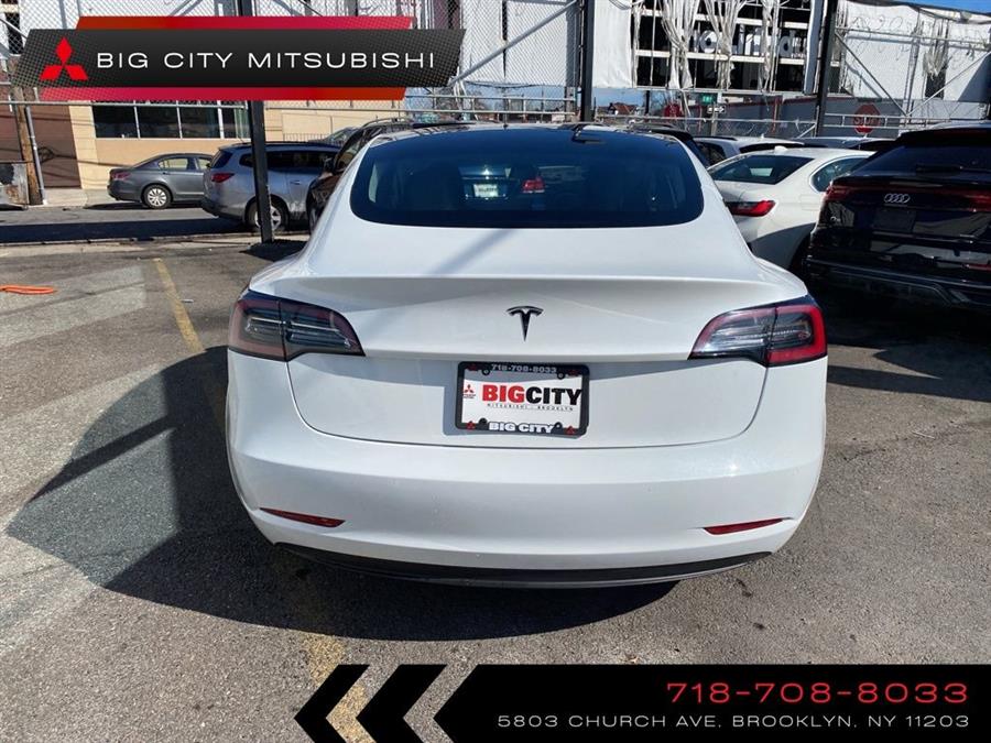 2021 Tesla Model 3 Standard Range Plus, available for sale in Floral Park, New York | Shop Auto NY. Floral Park, New York 2021 Tesla Model 3 Standard Range Plus, available for sale in Floral Park, New York | Shop Auto NY. Floral Park, New York
