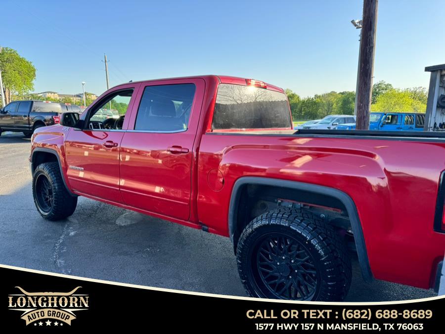 2015 GMC Sierra 1500 4WD Crew Cab 143.5" SLE, available for sale in Mansfield, Texas | Longhorn Auto Group. Mansfield, Texas 2015 GMC Sierra 1500 4WD Crew Cab 143.5" SLE, available for sale in Mansfield, Texas | Longhorn Auto Group. Mansfield, Texas