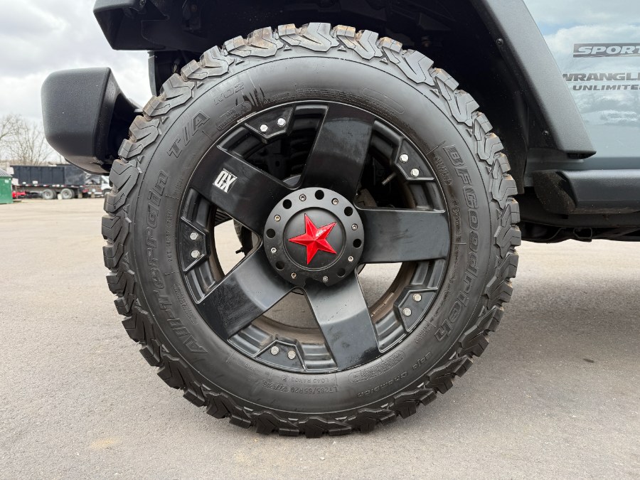 2014 Jeep Wrangler Unlimited 4WD 4dr Sport, available for sale in Ortonville, Michigan | Marsh Auto Sales LLC. Ortonville, Michigan 2014 Jeep Wrangler Unlimited 4WD 4dr Sport, available for sale in Ortonville, Michigan | Marsh Auto Sales LLC. Ortonville, Michigan