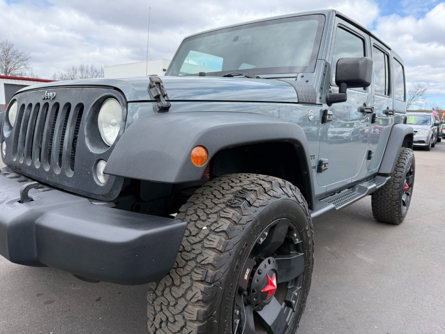 2014 Jeep Wrangler Unlimited 4WD 4dr Sport, available for sale in Ortonville, Michigan | Marsh Auto Sales LLC. Ortonville, Michigan 2014 Jeep Wrangler Unlimited 4WD 4dr Sport, available for sale in Ortonville, Michigan | Marsh Auto Sales LLC. Ortonville, Michigan