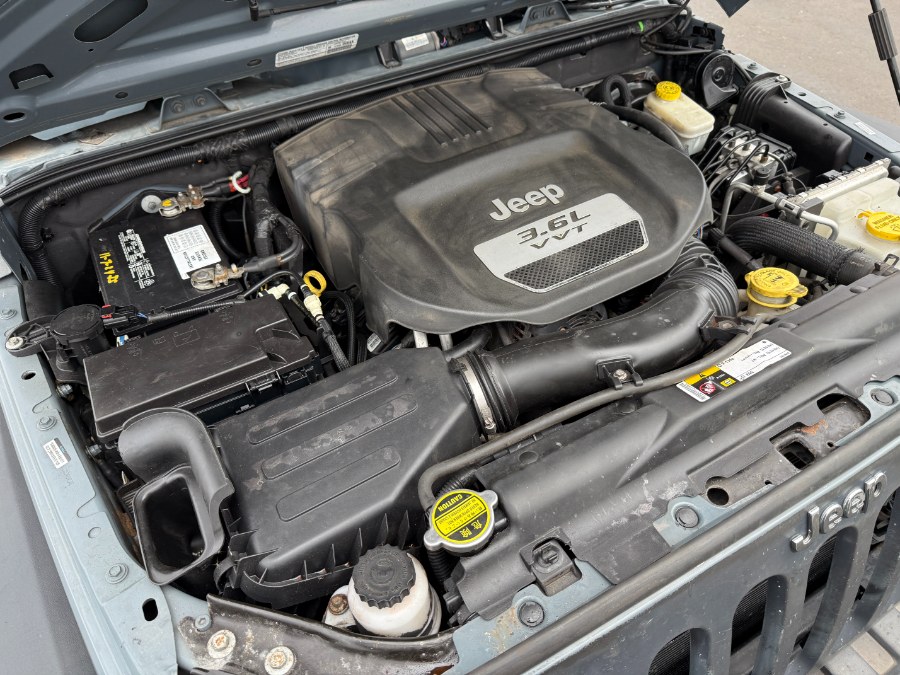 2014 Jeep Wrangler Unlimited 4WD 4dr Sport, available for sale in Ortonville, Michigan | Marsh Auto Sales LLC. Ortonville, Michigan 2014 Jeep Wrangler Unlimited 4WD 4dr Sport, available for sale in Ortonville, Michigan | Marsh Auto Sales LLC. Ortonville, Michigan