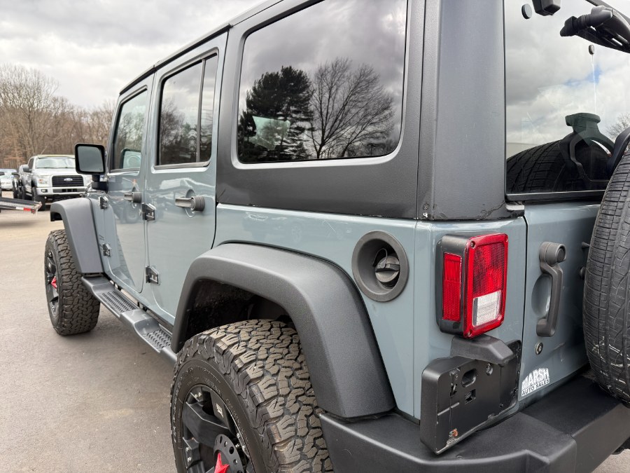 2014 Jeep Wrangler Unlimited 4WD 4dr Sport, available for sale in Ortonville, Michigan | Marsh Auto Sales LLC. Ortonville, Michigan 2014 Jeep Wrangler Unlimited 4WD 4dr Sport, available for sale in Ortonville, Michigan | Marsh Auto Sales LLC. Ortonville, Michigan
