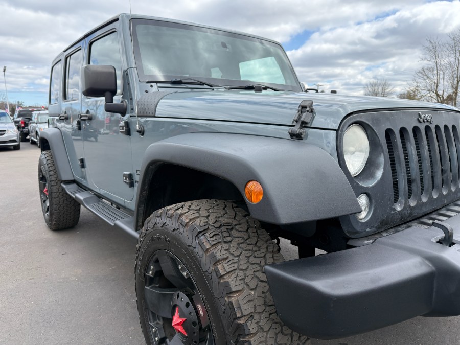 2014 Jeep Wrangler Unlimited 4WD 4dr Sport, available for sale in Ortonville, Michigan | Marsh Auto Sales LLC. Ortonville, Michigan 2014 Jeep Wrangler Unlimited 4WD 4dr Sport, available for sale in Ortonville, Michigan | Marsh Auto Sales LLC. Ortonville, Michigan