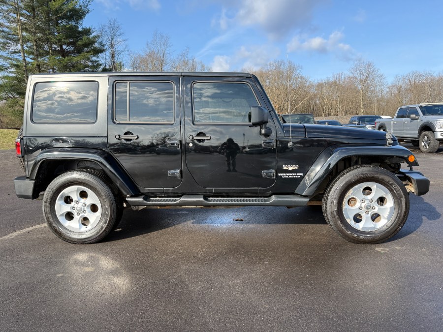 2015 Jeep Wrangler Unlimited 4WD 4dr Sahara, available for sale in Ortonville, Michigan | Marsh Auto Sales LLC. Ortonville, Michigan 2015 Jeep Wrangler Unlimited 4WD 4dr Sahara, available for sale in Ortonville, Michigan | Marsh Auto Sales LLC. Ortonville, Michigan