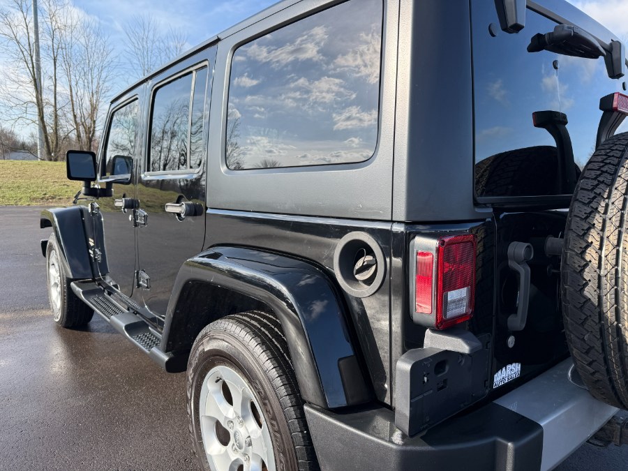 2015 Jeep Wrangler Unlimited 4WD 4dr Sahara, available for sale in Ortonville, Michigan | Marsh Auto Sales LLC. Ortonville, Michigan 2015 Jeep Wrangler Unlimited 4WD 4dr Sahara, available for sale in Ortonville, Michigan | Marsh Auto Sales LLC. Ortonville, Michigan