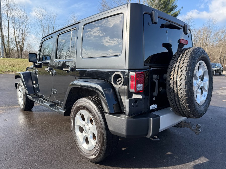 2015 Jeep Wrangler Unlimited 4WD 4dr Sahara, available for sale in Ortonville, Michigan | Marsh Auto Sales LLC. Ortonville, Michigan 2015 Jeep Wrangler Unlimited 4WD 4dr Sahara, available for sale in Ortonville, Michigan | Marsh Auto Sales LLC. Ortonville, Michigan