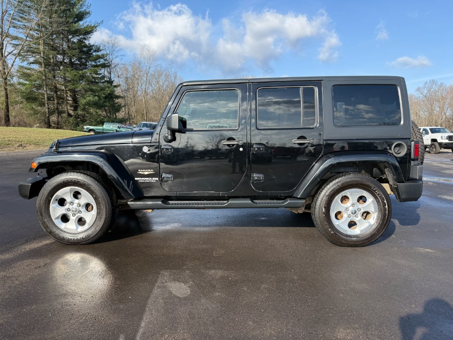 2015 Jeep Wrangler Unlimited 4WD 4dr Sahara, available for sale in Ortonville, Michigan | Marsh Auto Sales LLC. Ortonville, Michigan 2015 Jeep Wrangler Unlimited 4WD 4dr Sahara, available for sale in Ortonville, Michigan | Marsh Auto Sales LLC. Ortonville, Michigan