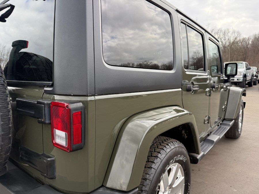 2015 Jeep Wrangler Unlimited 4WD 4dr Sahara, available for sale in Ortonville, Michigan | Marsh Auto Sales LLC. Ortonville, Michigan 2015 Jeep Wrangler Unlimited 4WD 4dr Sahara, available for sale in Ortonville, Michigan | Marsh Auto Sales LLC. Ortonville, Michigan