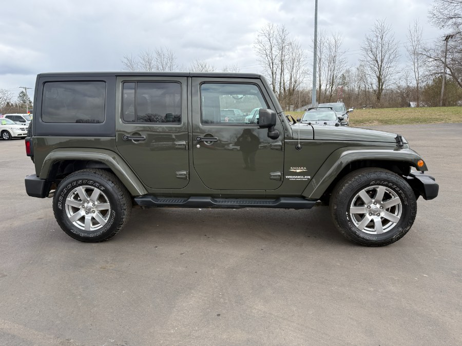 2015 Jeep Wrangler Unlimited 4WD 4dr Sahara, available for sale in Ortonville, Michigan | Marsh Auto Sales LLC. Ortonville, Michigan 2015 Jeep Wrangler Unlimited 4WD 4dr Sahara, available for sale in Ortonville, Michigan | Marsh Auto Sales LLC. Ortonville, Michigan