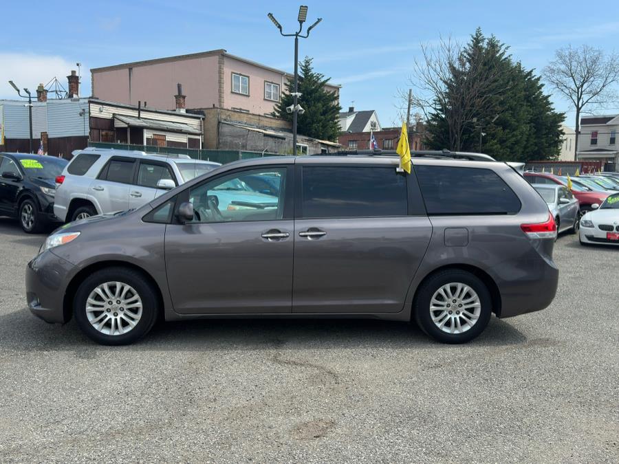 2014 Toyota Sienna 5dr 8-Pass Van V6 XLE FWD (Natl), available for sale in Irvington , New Jersey | Auto Haus of Irvington Corp. Irvington , New Jersey 2014 Toyota Sienna 5dr 8-Pass Van V6 XLE FWD (Natl), available for sale in Irvington , New Jersey | Auto Haus of Irvington Corp. Irvington , New Jersey