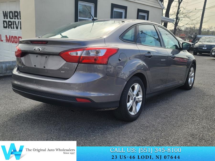 2014 Ford Focus 4dr Sdn SE, available for sale in Lodi, New Jersey | AW Auto & Truck Wholesalers, Inc. Lodi, New Jersey 2014 Ford Focus 4dr Sdn SE, available for sale in Lodi, New Jersey | AW Auto & Truck Wholesalers, Inc. Lodi, New Jersey