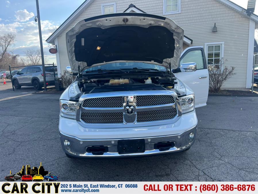 2014 Ram 1500 4WD Crew Cab 140.5" Longhorn, available for sale in East Windsor, Connecticut | Car City LLC. East Windsor, Connecticut 2014 Ram 1500 4WD Crew Cab 140.5" Longhorn, available for sale in East Windsor, Connecticut | Car City LLC. East Windsor, Connecticut