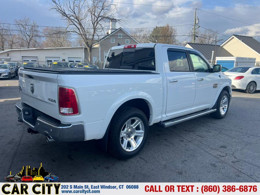 2014 Ram 1500 4WD Crew Cab 140.5" Longhorn, available for sale in East Windsor, Connecticut | Car City LLC. East Windsor, Connecticut 2014 Ram 1500 4WD Crew Cab 140.5" Longhorn, available for sale in East Windsor, Connecticut | Car City LLC. East Windsor, Connecticut
