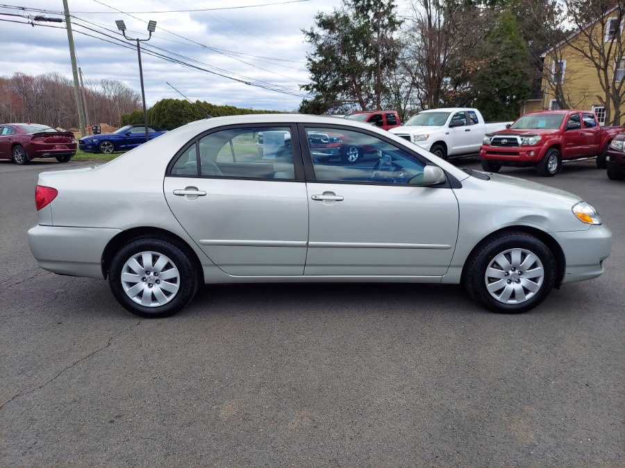 2004 Toyota Corolla 4dr Sdn LE Auto (Natl), available for sale in East Windsor, Connecticut | United Auto Sales of E Windsor, Inc. East Windsor, Connecticut 2004 Toyota Corolla 4dr Sdn LE Auto (Natl), available for sale in East Windsor, Connecticut | United Auto Sales of E Windsor, Inc. East Windsor, Connecticut