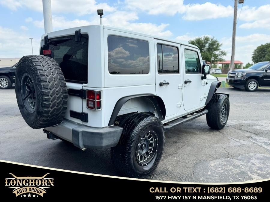 2013 Jeep Wrangler Unlimited 4WD 4dr Sahara, available for sale in Mansfield, Texas | Longhorn Auto Group. Mansfield, Texas 2013 Jeep Wrangler Unlimited 4WD 4dr Sahara, available for sale in Mansfield, Texas | Longhorn Auto Group. Mansfield, Texas