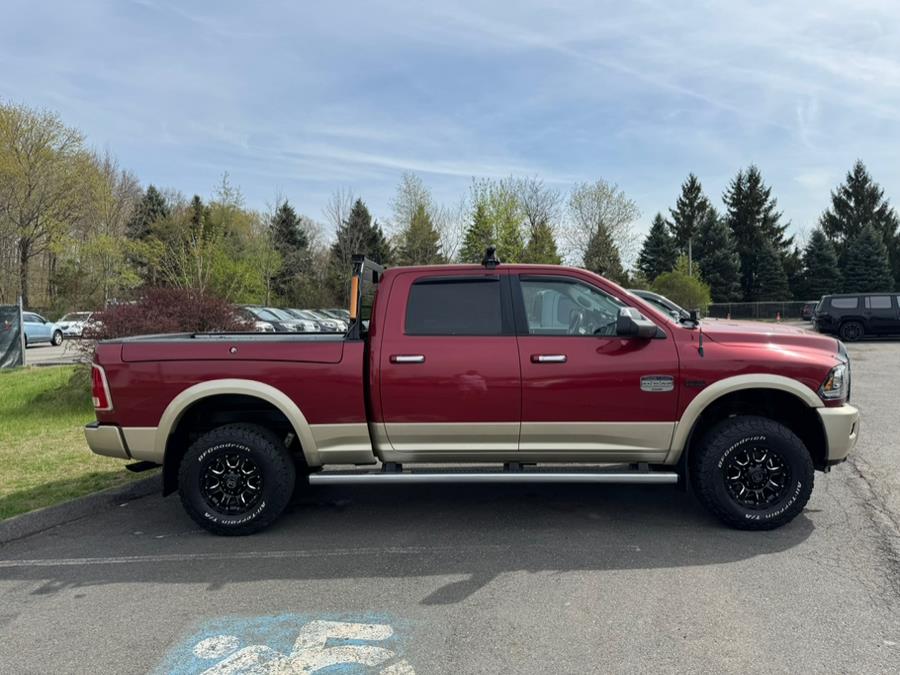 2013 Ram 2500 4WD Crew Cab 149" Laramie Longhorn, available for sale in Berlin, Connecticut | Tru Auto Mall. Berlin, Connecticut 2013 Ram 2500 4WD Crew Cab 149" Laramie Longhorn, available for sale in Berlin, Connecticut | Tru Auto Mall. Berlin, Connecticut