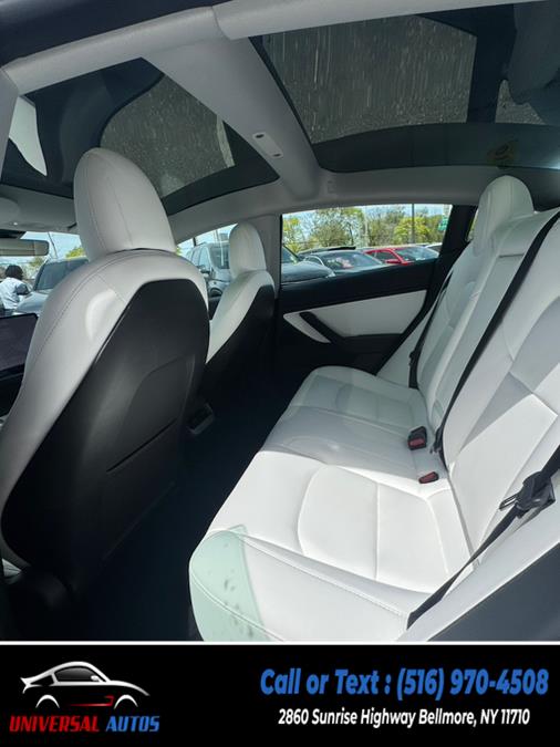 2021 Tesla Model 3 Long Range AWD, available for sale in Bellmore, New York | Universal Autos. Bellmore, New York 2021 Tesla Model 3 Long Range AWD, available for sale in Bellmore, New York | Universal Autos. Bellmore, New York