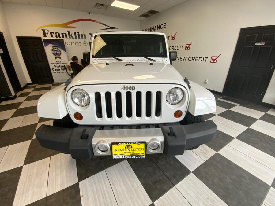 2012 Jeep Wrangler Unlimited 4WD 4dr Sahara, available for sale in Hartford, Connecticut | Franklin Motors Auto Sales LLC. Hartford, Connecticut 2012 Jeep Wrangler Unlimited 4WD 4dr Sahara, available for sale in Hartford, Connecticut | Franklin Motors Auto Sales LLC. Hartford, Connecticut