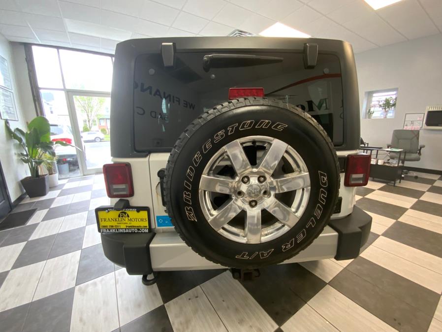 2012 Jeep Wrangler Unlimited 4WD 4dr Sahara, available for sale in Hartford, Connecticut | Franklin Motors Auto Sales LLC. Hartford, Connecticut 2012 Jeep Wrangler Unlimited 4WD 4dr Sahara, available for sale in Hartford, Connecticut | Franklin Motors Auto Sales LLC. Hartford, Connecticut