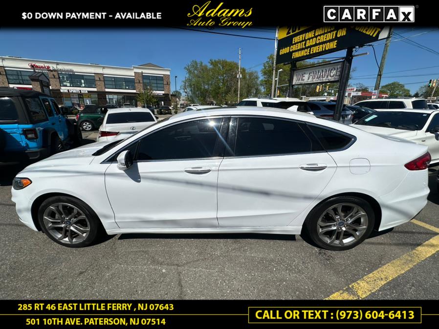 2019 Ford Fusion SEL FWD, available for sale in Paterson, New Jersey | Adams Auto Group. Paterson, New Jersey 2019 Ford Fusion SEL FWD, available for sale in Paterson, New Jersey | Adams Auto Group. Paterson, New Jersey