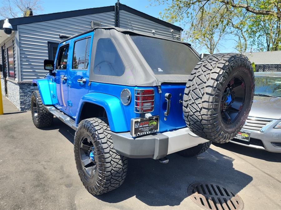 2015 Jeep Wrangler Unlimited 4WD 4dr Sahara, available for sale in Islip, New York | L.I. Auto Gallery. Islip, New York 2015 Jeep Wrangler Unlimited 4WD 4dr Sahara, available for sale in Islip, New York | L.I. Auto Gallery. Islip, New York