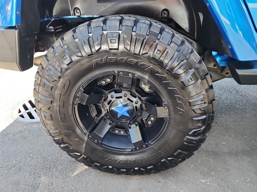 2015 Jeep Wrangler Unlimited 4WD 4dr Sahara, available for sale in Islip, New York | L.I. Auto Gallery. Islip, New York 2015 Jeep Wrangler Unlimited 4WD 4dr Sahara, available for sale in Islip, New York | L.I. Auto Gallery. Islip, New York