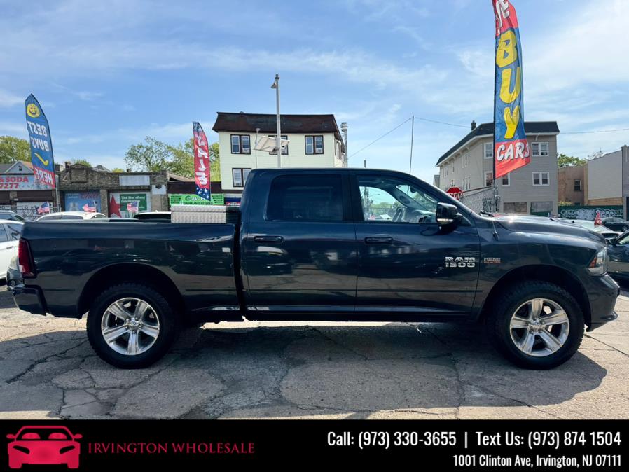 2015 Ram 1500 4WD Crew Cab 149" Sport, available for sale in Irvington, New Jersey | Irvington Wholesale Group. Irvington, New Jersey 2015 Ram 1500 4WD Crew Cab 149" Sport, available for sale in Irvington, New Jersey | Irvington Wholesale Group. Irvington, New Jersey