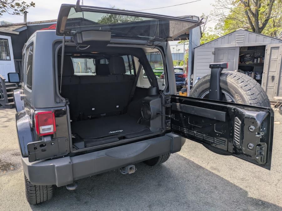 2013 Jeep Wrangler Unlimited 4WD 4dr Sahara, available for sale in Long Island City, New York | Luxury Of Queens. Long Island City, New York 2013 Jeep Wrangler Unlimited 4WD 4dr Sahara, available for sale in Long Island City, New York | Luxury Of Queens. Long Island City, New York