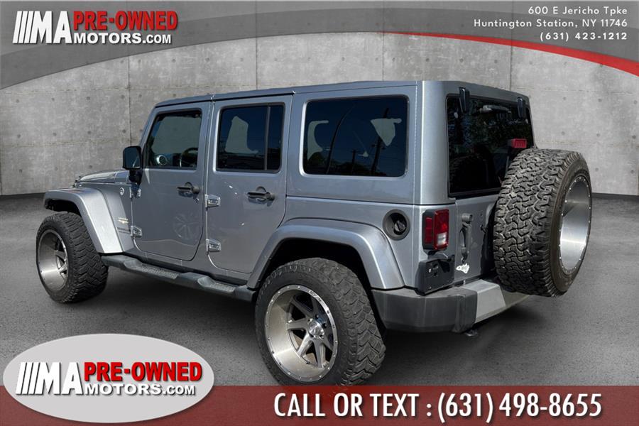 2013 Jeep Wrangler Unlimited 4WD 4dr Sahara, available for sale in Huntington Station, New York | M & A Motors. Huntington Station, New York 2013 Jeep Wrangler Unlimited 4WD 4dr Sahara, available for sale in Huntington Station, New York | M & A Motors. Huntington Station, New York
