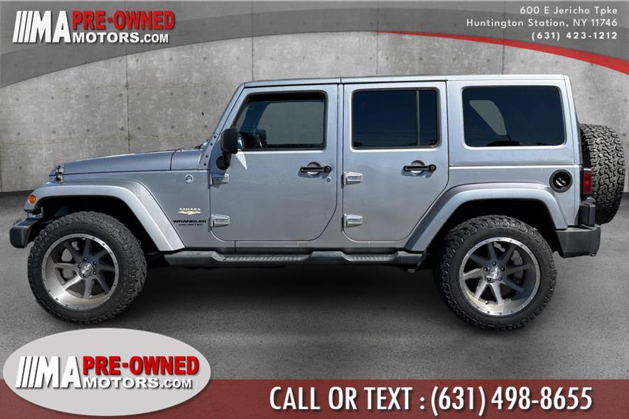 2013 Jeep Wrangler Unlimited 4WD 4dr Sahara, available for sale in Huntington Station, New York | M & A Motors. Huntington Station, New York 2013 Jeep Wrangler Unlimited 4WD 4dr Sahara, available for sale in Huntington Station, New York | M & A Motors. Huntington Station, New York