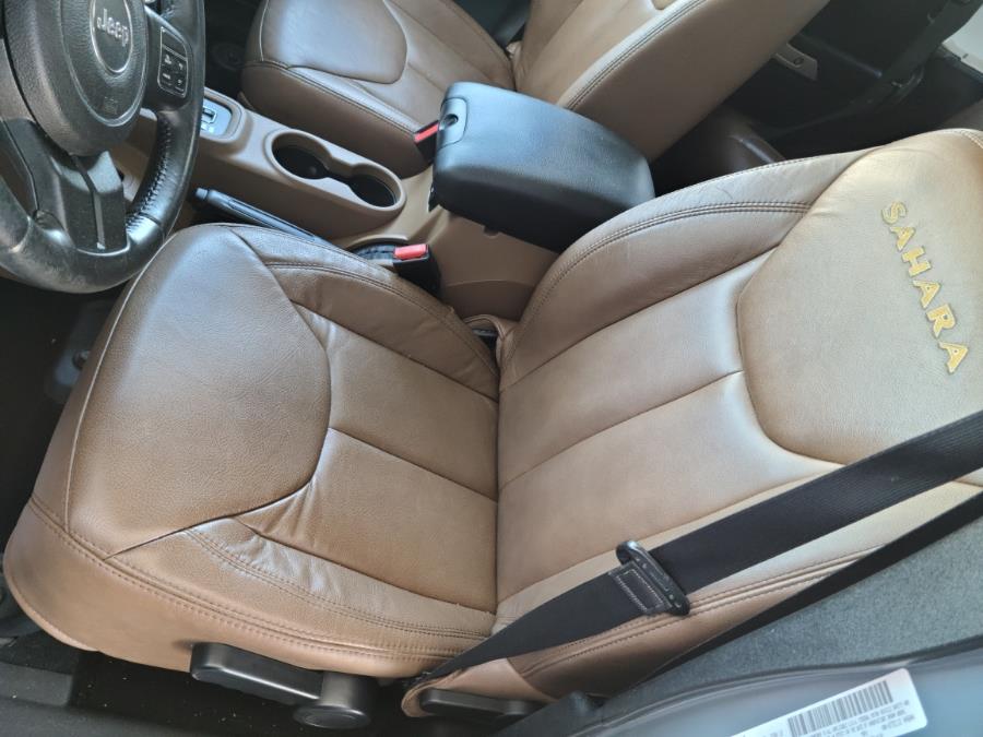 2014 Jeep Wrangler Unlimited 4WD 4dr Sahara, available for sale in Milford, Connecticut | Chip's Auto Sales Inc. Milford, Connecticut 2014 Jeep Wrangler Unlimited 4WD 4dr Sahara, available for sale in Milford, Connecticut | Chip's Auto Sales Inc. Milford, Connecticut