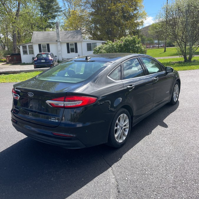 2019 Ford Fusion Hybrid SE FWD, available for sale in Hicksville, New York | REGAL AUTOHAUS. Hicksville, New York 2019 Ford Fusion Hybrid SE FWD, available for sale in Hicksville, New York | REGAL AUTOHAUS. Hicksville, New York