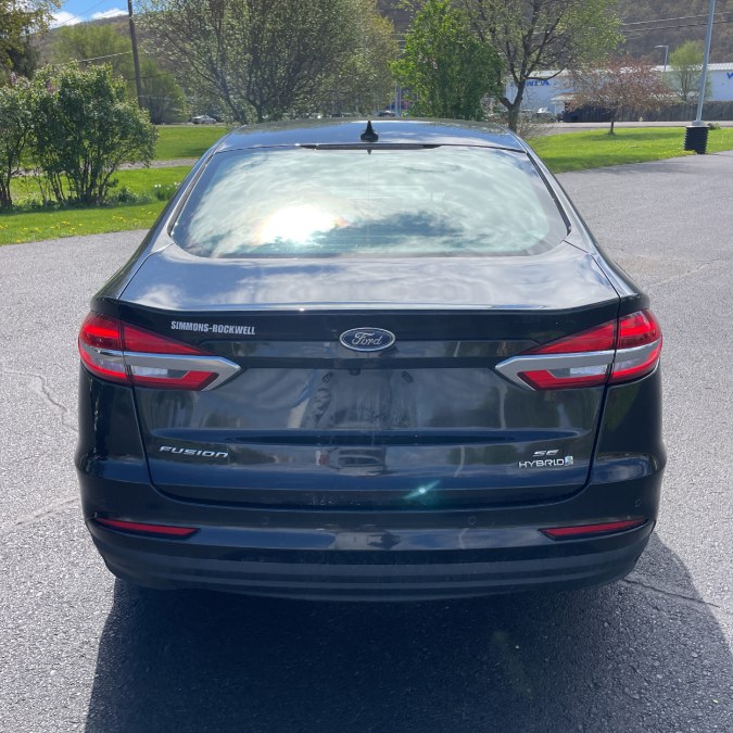 2019 Ford Fusion Hybrid SE FWD, available for sale in Hicksville, New York | REGAL AUTOHAUS. Hicksville, New York 2019 Ford Fusion Hybrid SE FWD, available for sale in Hicksville, New York | REGAL AUTOHAUS. Hicksville, New York