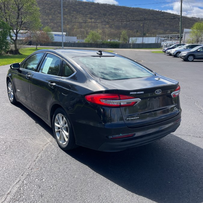 2019 Ford Fusion Hybrid SE FWD, available for sale in Hicksville, New York | REGAL AUTOHAUS. Hicksville, New York 2019 Ford Fusion Hybrid SE FWD, available for sale in Hicksville, New York | REGAL AUTOHAUS. Hicksville, New York