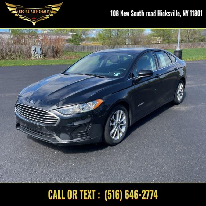 2019 Ford Fusion Hybrid SE FWD, available for sale in Hicksville, New York | REGAL AUTOHAUS. Hicksville, New York 2019 Ford Fusion Hybrid SE FWD, available for sale in Hicksville, New York | REGAL AUTOHAUS. Hicksville, New York