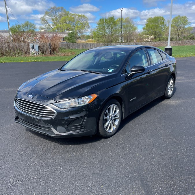 2019 Ford Fusion Hybrid SE FWD, available for sale in Hicksville, New York | REGAL AUTOHAUS. Hicksville, New York 2019 Ford Fusion Hybrid SE FWD, available for sale in Hicksville, New York | REGAL AUTOHAUS. Hicksville, New York