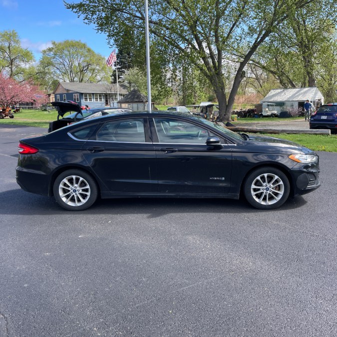 2019 Ford Fusion Hybrid SE FWD, available for sale in Hicksville, New York | REGAL AUTOHAUS. Hicksville, New York 2019 Ford Fusion Hybrid SE FWD, available for sale in Hicksville, New York | REGAL AUTOHAUS. Hicksville, New York