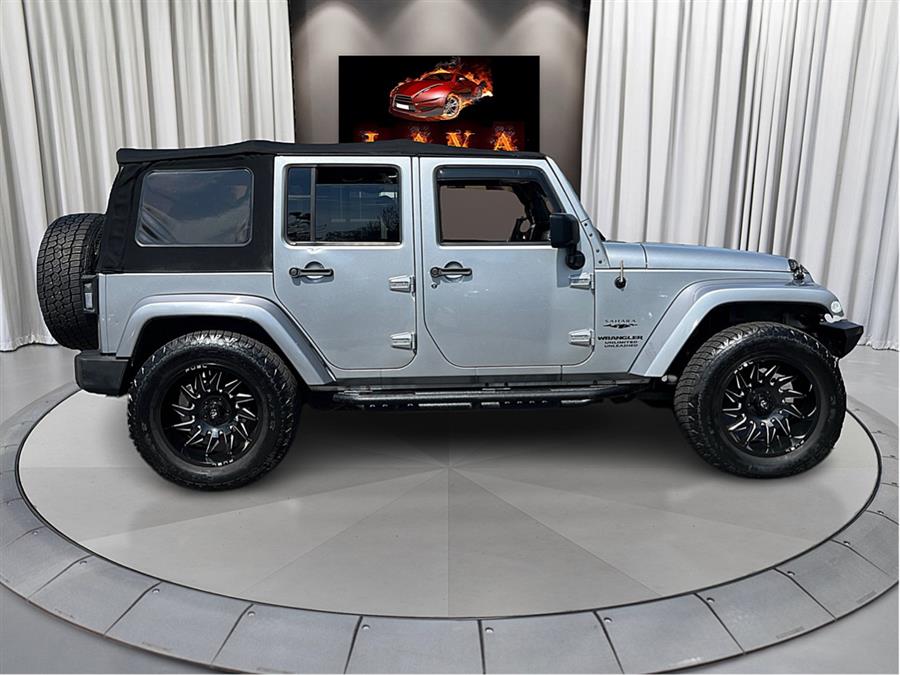 2013 Jeep Wrangler Unlimited 4WD 4dr Sahara, available for sale in Canton, Connecticut | Lava Motors. Canton, Connecticut 2013 Jeep Wrangler Unlimited 4WD 4dr Sahara, available for sale in Canton, Connecticut | Lava Motors. Canton, Connecticut