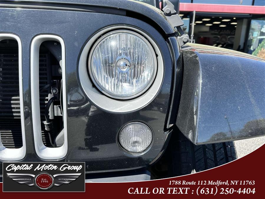 2018 Jeep Wrangler JK Unlimited Sahara 4x4, available for sale in Medford, New York | Capital Motor Group Inc. Medford, New York 2018 Jeep Wrangler JK Unlimited Sahara 4x4, available for sale in Medford, New York | Capital Motor Group Inc. Medford, New York