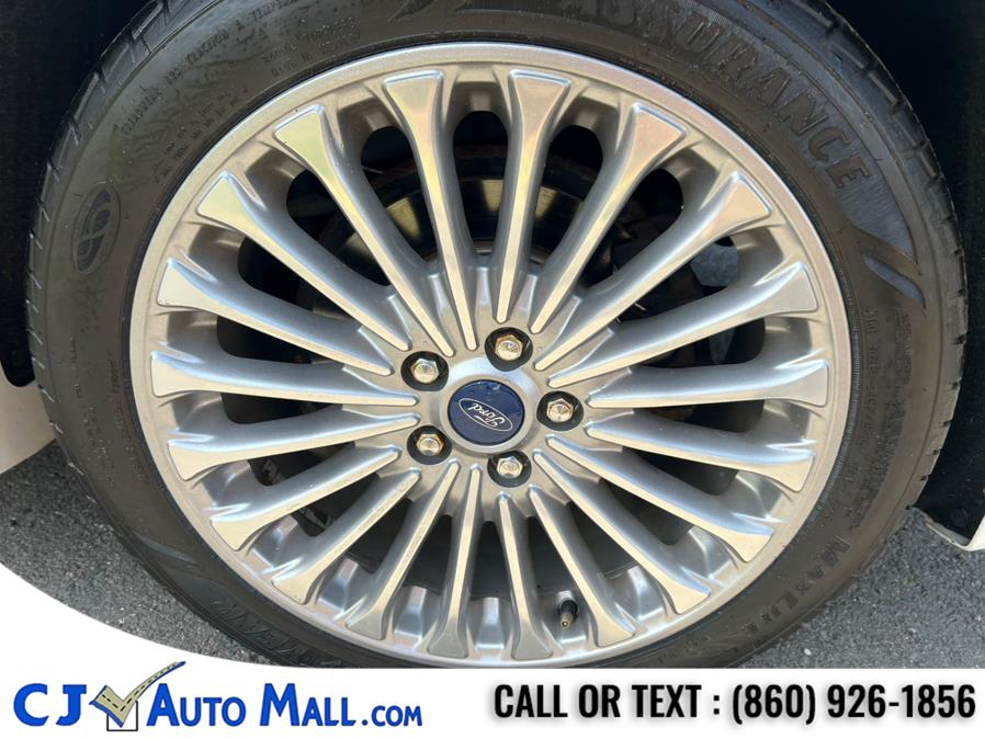 2015 Ford Fusion 4dr Sdn Titanium FWD, available for sale in Bristol, Connecticut | CJ Auto Mall. Bristol, Connecticut 2015 Ford Fusion 4dr Sdn Titanium FWD, available for sale in Bristol, Connecticut | CJ Auto Mall. Bristol, Connecticut