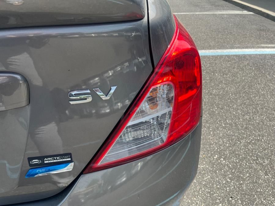 2014 Nissan Versa 4dr Sdn CVT 1.6 SV, available for sale in Elmont, New York | Sunrise of Elmont. Elmont, New York 2014 Nissan Versa 4dr Sdn CVT 1.6 SV, available for sale in Elmont, New York | Sunrise of Elmont. Elmont, New York