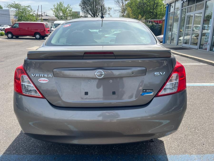 2014 Nissan Versa 4dr Sdn CVT 1.6 SV, available for sale in Elmont, New York | Sunrise of Elmont. Elmont, New York 2014 Nissan Versa 4dr Sdn CVT 1.6 SV, available for sale in Elmont, New York | Sunrise of Elmont. Elmont, New York
