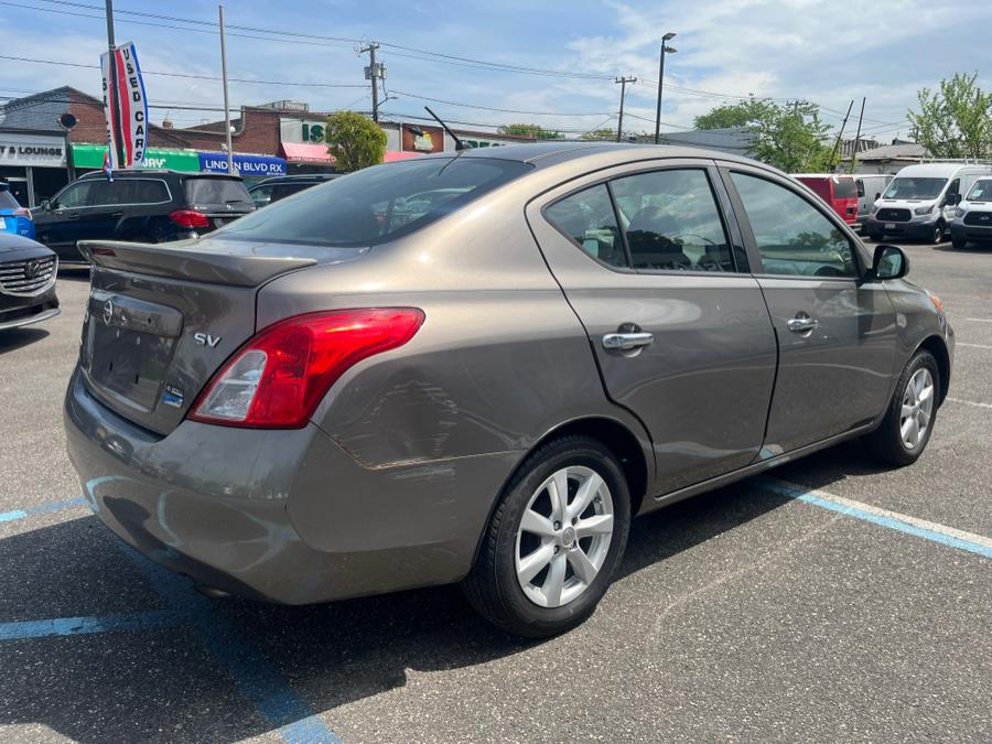 2014 Nissan Versa 4dr Sdn CVT 1.6 SV, available for sale in Elmont, New York | Sunrise of Elmont. Elmont, New York 2014 Nissan Versa 4dr Sdn CVT 1.6 SV, available for sale in Elmont, New York | Sunrise of Elmont. Elmont, New York