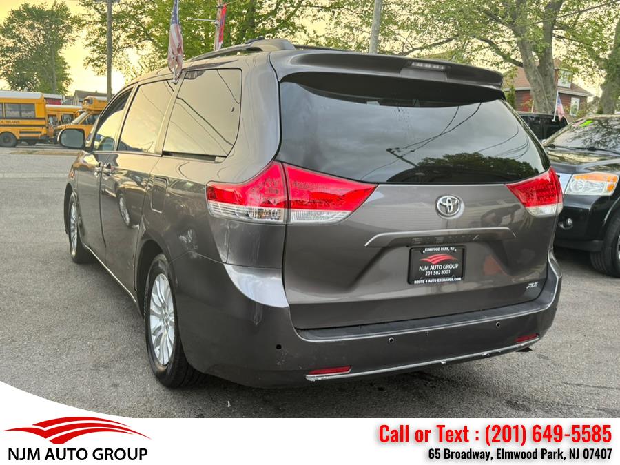 2013 Toyota Sienna 5dr 8-Pass Van V6 XLE FWD, available for sale in Elmwood Park, New Jersey | NJM Auto Group. Elmwood Park, New Jersey 2013 Toyota Sienna 5dr 8-Pass Van V6 XLE FWD, available for sale in Elmwood Park, New Jersey | NJM Auto Group. Elmwood Park, New Jersey