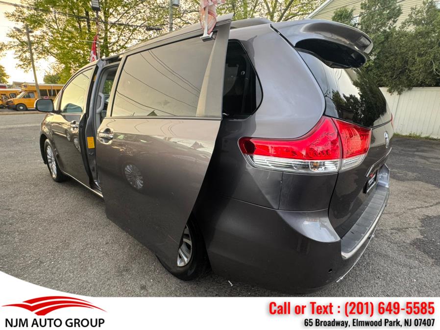 2013 Toyota Sienna 5dr 8-Pass Van V6 XLE FWD, available for sale in Elmwood Park, New Jersey | NJM Auto Group. Elmwood Park, New Jersey 2013 Toyota Sienna 5dr 8-Pass Van V6 XLE FWD, available for sale in Elmwood Park, New Jersey | NJM Auto Group. Elmwood Park, New Jersey