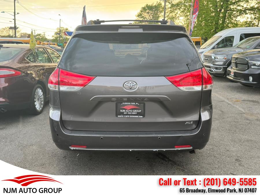 2013 Toyota Sienna 5dr 8-Pass Van V6 XLE FWD, available for sale in Elmwood Park, New Jersey | NJM Auto Group. Elmwood Park, New Jersey 2013 Toyota Sienna 5dr 8-Pass Van V6 XLE FWD, available for sale in Elmwood Park, New Jersey | NJM Auto Group. Elmwood Park, New Jersey