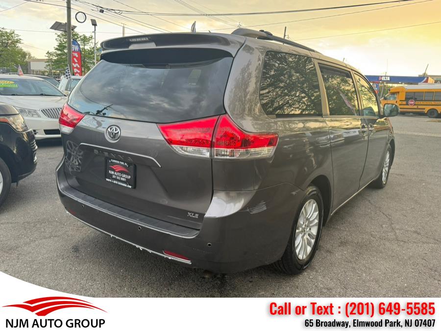 2013 Toyota Sienna 5dr 8-Pass Van V6 XLE FWD, available for sale in Elmwood Park, New Jersey | NJM Auto Group. Elmwood Park, New Jersey 2013 Toyota Sienna 5dr 8-Pass Van V6 XLE FWD, available for sale in Elmwood Park, New Jersey | NJM Auto Group. Elmwood Park, New Jersey