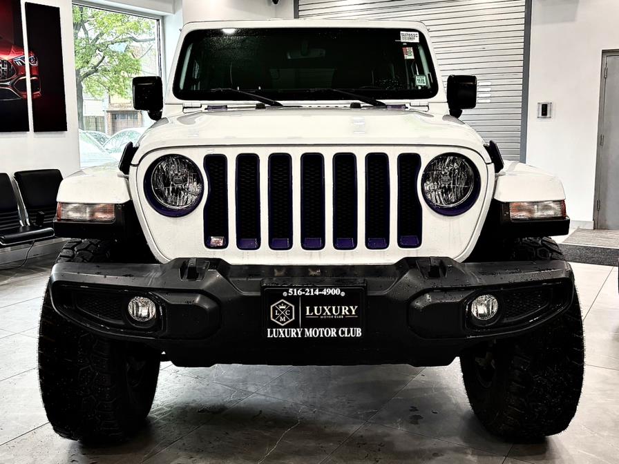 2022 Jeep Wrangler Unlimited Sahara Altitude 4x4, available for sale in Franklin Square, New York | Luxury Motor Club. Franklin Square, New York 2022 Jeep Wrangler Unlimited Sahara Altitude 4x4, available for sale in Franklin Square, New York | Luxury Motor Club. Franklin Square, New York